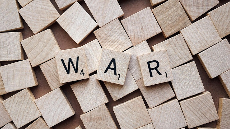 Krieg, Scrabble, Symbolbild